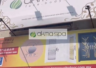Entrance signage of Akma Spa Sungai Buloh located in Shah Alam, Selangor, MY showcasing logo and security doors.