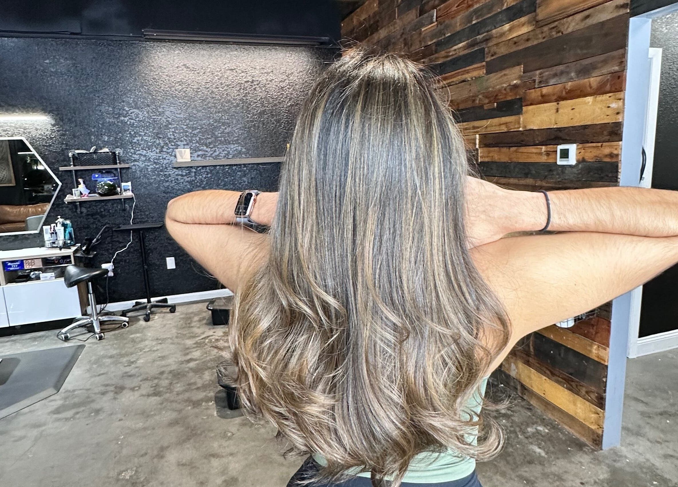 Luxurious hair treatment at Slay.it.te, Altamonte Springs, Florida, US, featuring elegant styling and decor.