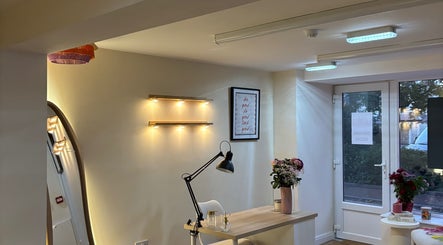 Inviting workspace at The Ladies Room in Lytham Saint Annes, England, GB with elegant decor and lighting.