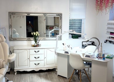 Bright and elegant interior of Nesta salon in Dudley, England, GB, featuring a stylish beauty station.