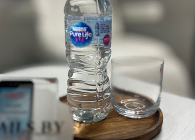 Nesta venue in Dudley, England, GB offers water and glass on tray for guest comfort.