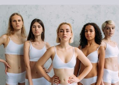 Group of confident individuals in sportswear at Inbodybondi, Sydney, New South Wales, AU showcasing wellness.