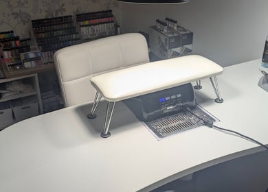 Tranquil manicure station at Louise's Nail Lounge, Stockton-on-tees, England, GB, featuring tools and polish display.