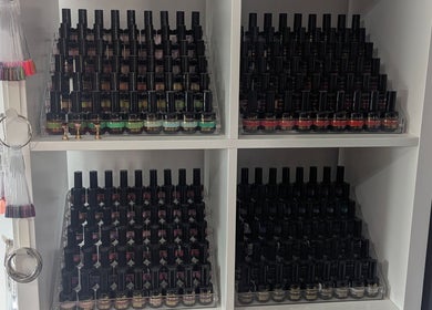 Colorful nail polish collection at Louise's Nail Lounge in Stockton-on-Tees, England, GB.