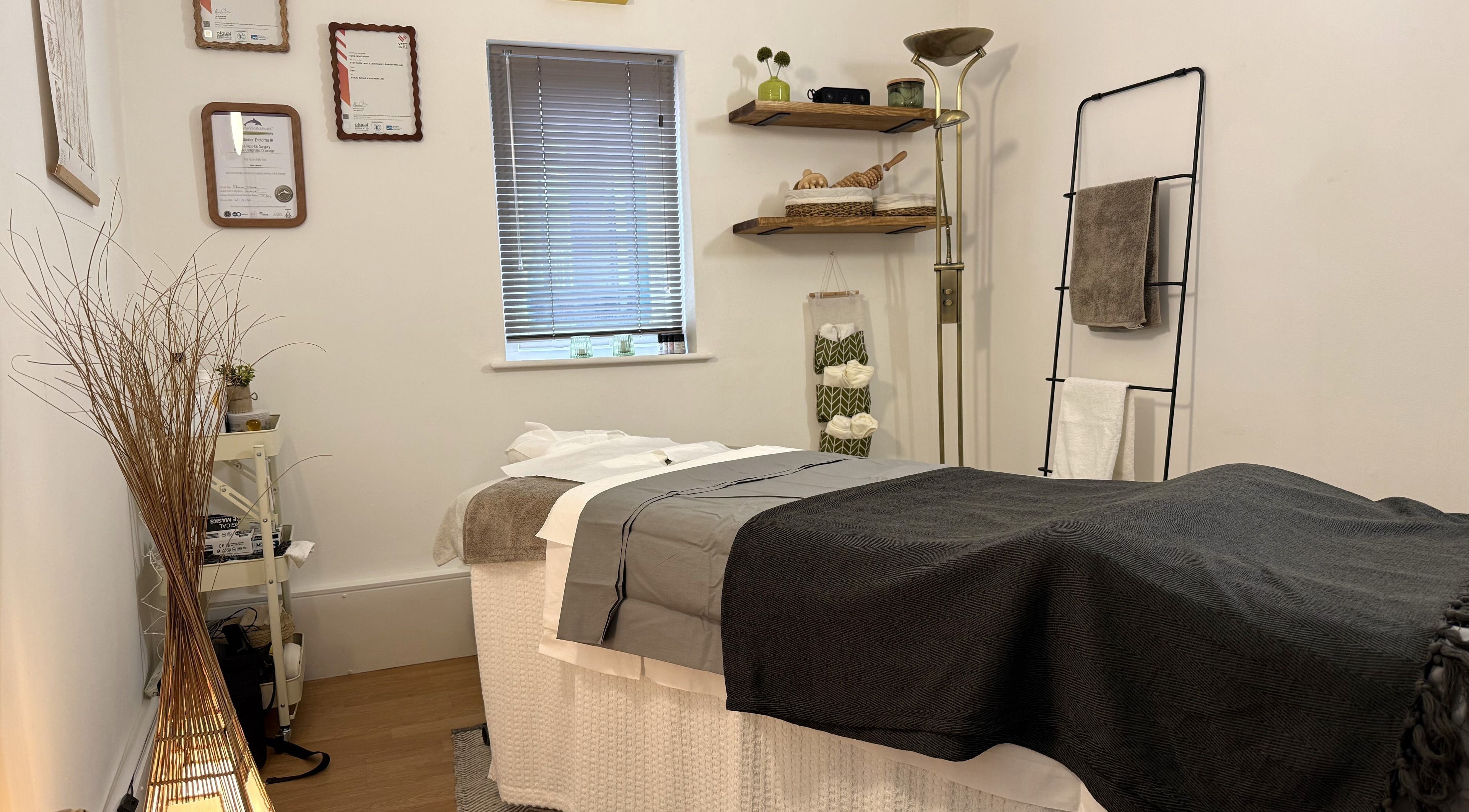 Cozy massage room at Landon Massage Therapies, Liverpool, England, GB, featuring a plush massage table.