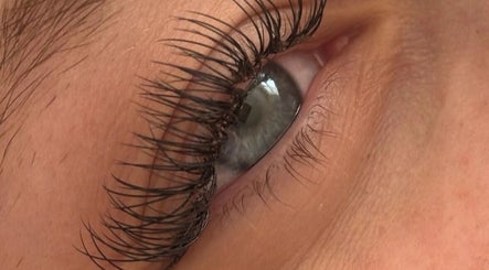 Close-up of expertly styled lashes at Dolls By Demi, Dagenham, England, GB, showcasing stunning eye detail.