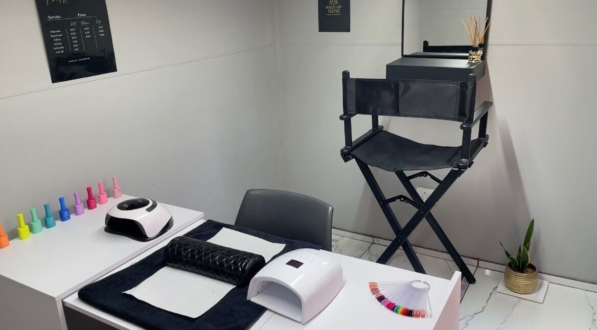 Nail station at Haus of Nene, Boksburg, Gauteng, ZA with colorful polishes and manicure tools.