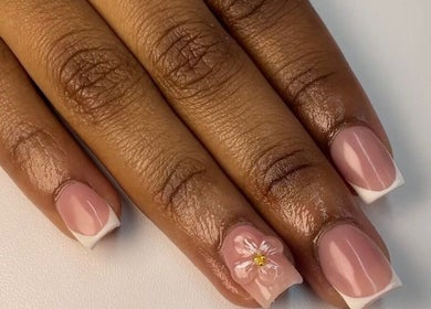Elegant French manicure with floral art at Haus of Nene, Boksburg, Gauteng, ZA.