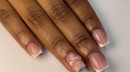 Elegant French manicure with floral art at Haus of Nene, Boksburg, Gauteng, ZA.