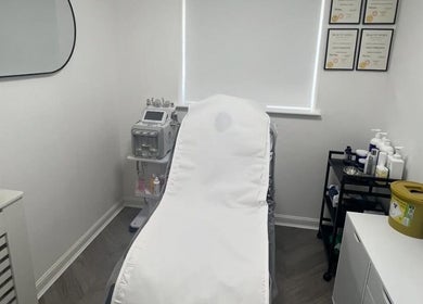 Modern treatment room at Skinsbyygrace in Liverpool, England, GB. Features skincare equipment and decor.