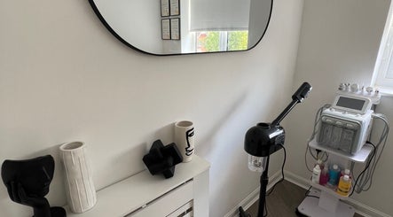 Modern skincare corner at Skinsbyygrace, Liverpool, England, GB, showcasing stylish decor and advanced facial equipment.