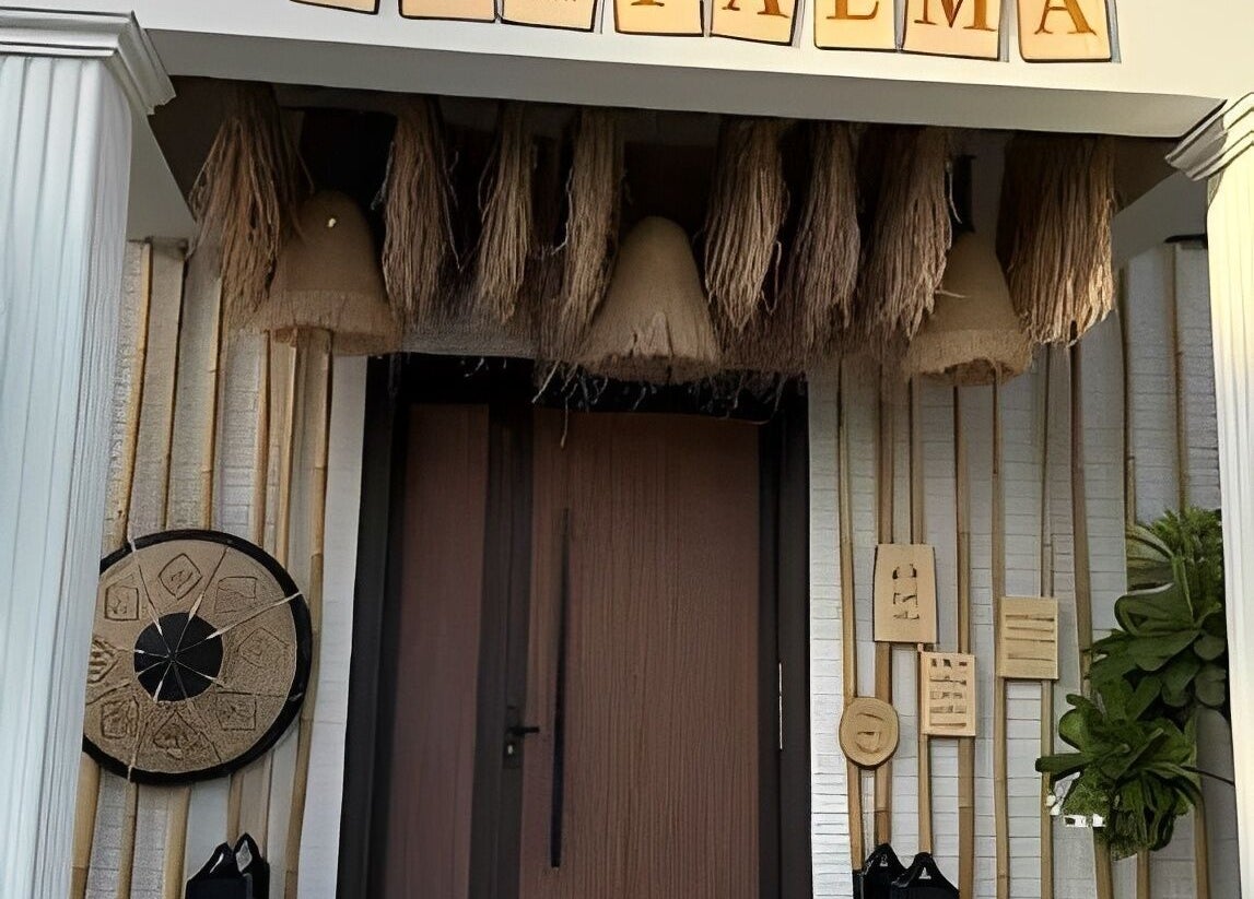 Rustic decor at De Palma Nail Spa entrance in Makkah, Makkah Province, SA, featuring natural elements.