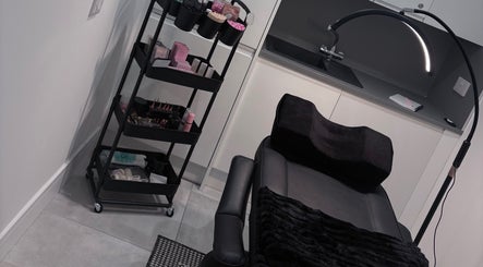 Luxurious treatment room at Ova Beauty Bar, Banchory, Scotland, GB with a relaxing chair and organized supplies.