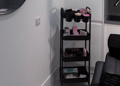 Beauty workstation at Ova Beauty Bar, Banchory, Scotland, GB, featuring organized beauty tools and products.