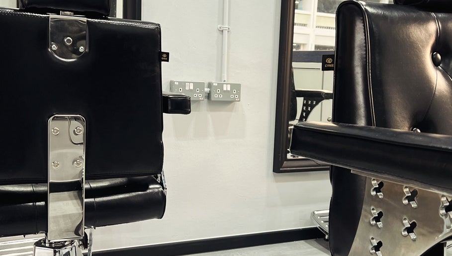 Modern black salon chairs at TL Hair Studio Sg in Singapore, Singapore, SG, showcasing comfort and style.