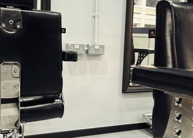 Modern black salon chairs at TL Hair Studio Sg in Singapore, Singapore, SG, showcasing comfort and style.