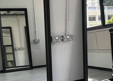 Sleek mirrors reflecting modern design at TL Hair Studio Sg, Singapore, Singapore, SG.