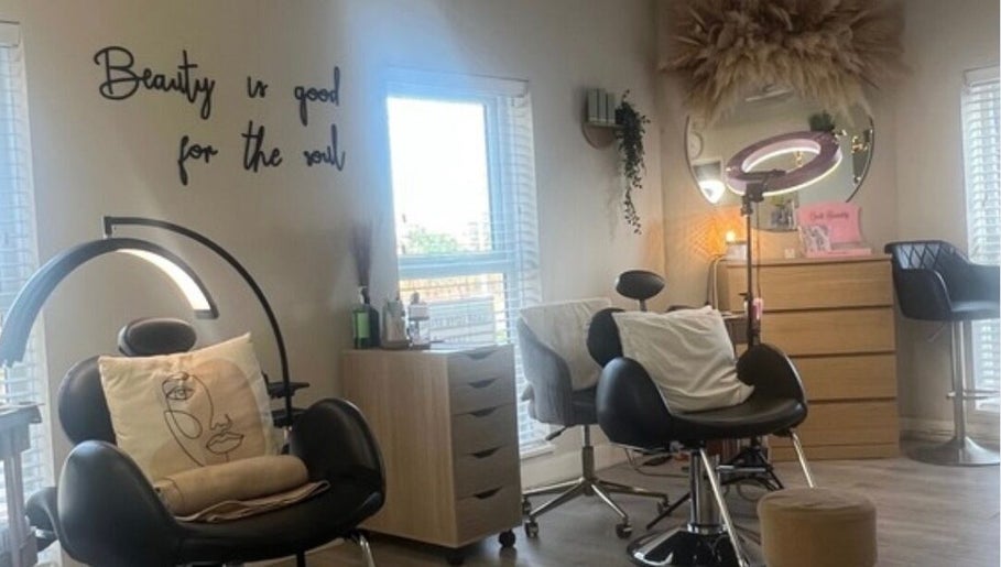 Tranquil beauty room at Beauty By Nichola, Bromborough, England, GB, with modern decor and styling chairs.