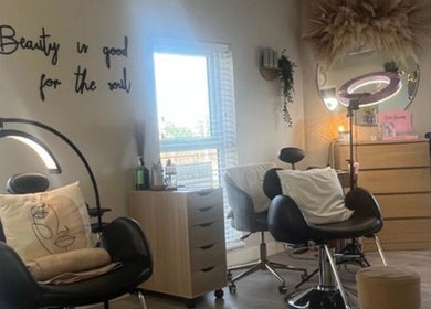Tranquil beauty room at Beauty By Nichola, Bromborough, England, GB, with modern decor and styling chairs.