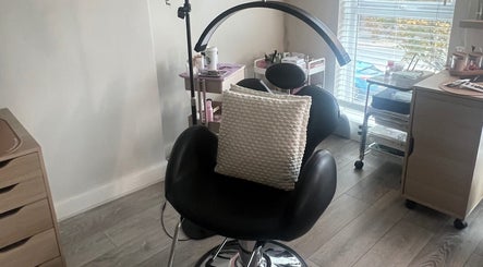 Cozy salon chair in Beauty By Nichola, Bromborough, England, GB, ready for pampering appointments.