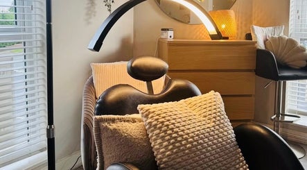 Relaxing beauty chair at Beauty By Nichola, Bromborough, England, GB with soft lighting and plush cushions.
