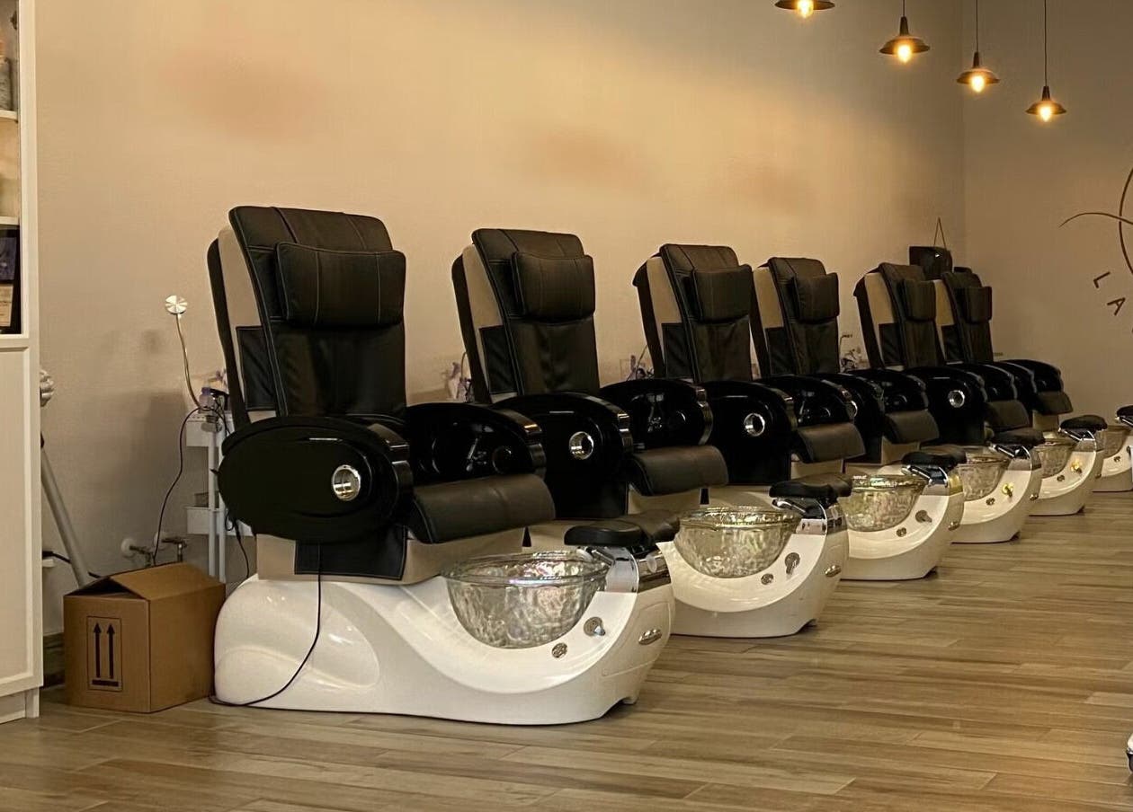 Luxurious pedicure chairs at Lavish Nails, Conroe, Texas, US, embody a serene spa experience.