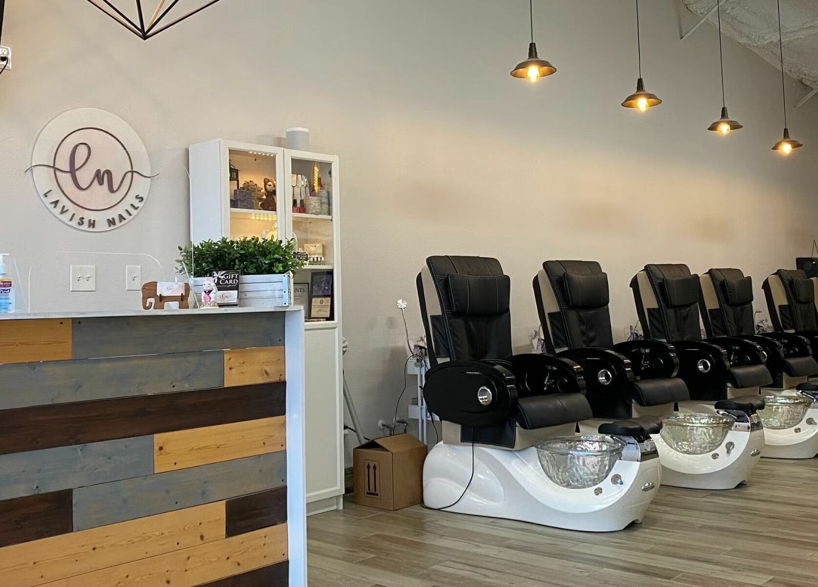 Modern pedicure chairs at Lavish Nails in Conroe, Texas, US. Inviting and stylish salon interior.