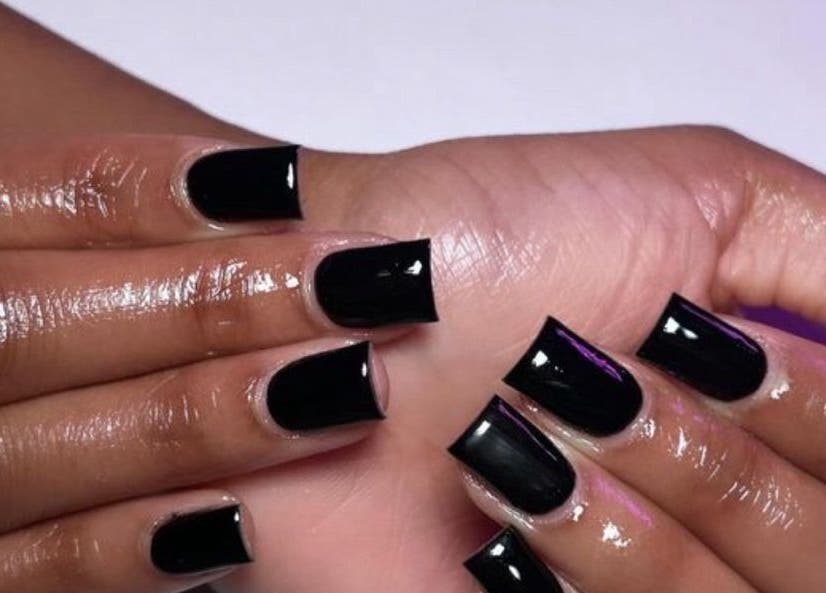 Stylish black manicure at Kischa_co, Windhoek, Khomas Region, NA, showcasing glossy elegance.