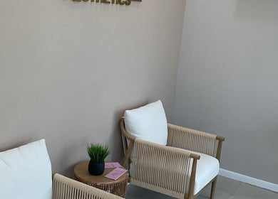 Cozy seating area at RejuveNurse Aesthetics, Saint Ann's Bay, St. Ann Parish, JM with elegant decor.