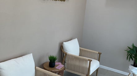 Cozy seating area at RejuveNurse Aesthetics, Saint Ann's Bay, St. Ann Parish, JM with elegant decor.