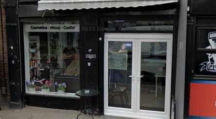 Front view of WaxByLora in London, England, GB showcasing a stylish entrance with signage.