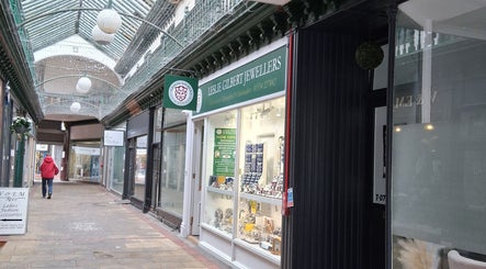 Entrance to Hair by Lorraine at Locks and Lashes in Llanelli, Wales, GB, showcasing an inviting arcade.
