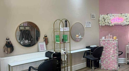 Stylish interior of Hair by Lorraine at Locks and Lashes Llanelli, Llanelli, Wales, GB with floral decor.
