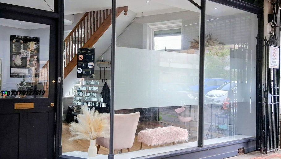 View of Hair by Lorraine at Locks and Lashes Llanelli front entrance, Llanelli, Wales, GB, showcasing cozy interior.
