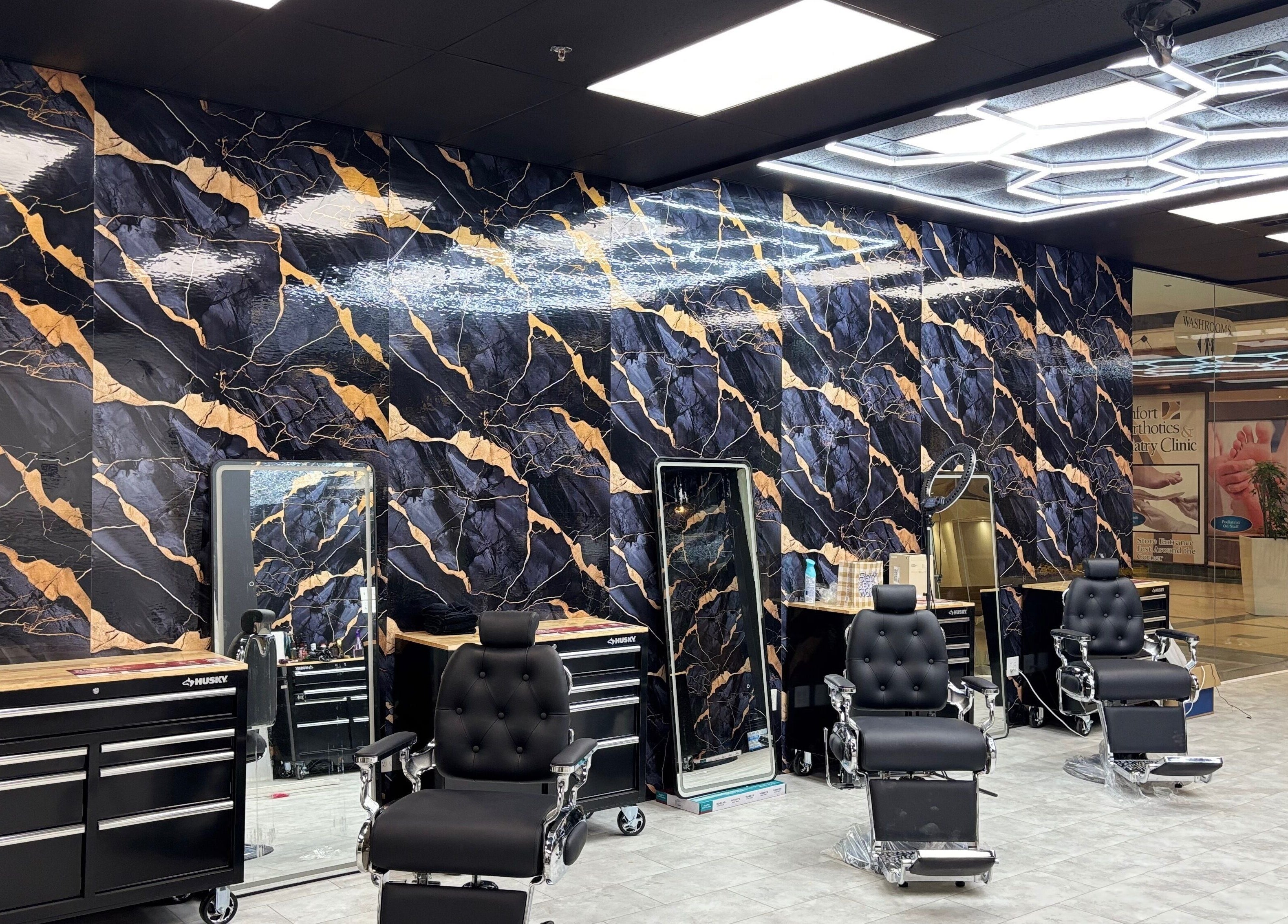 Elegant barber chairs and artistic wall design at Bedford (Sunnyside Mall), Bedford, Nova Scotia, CA.