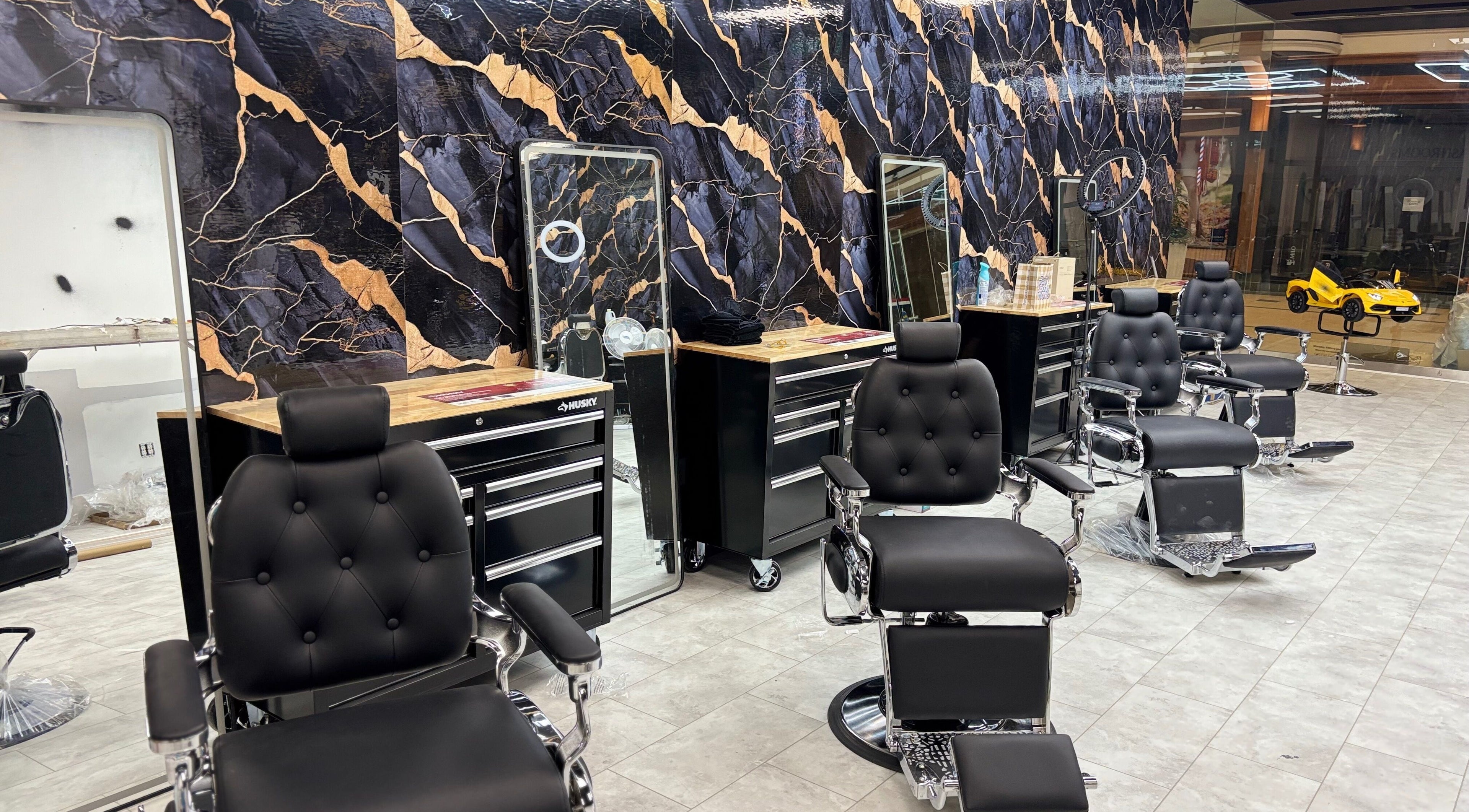 Sleek barber chairs at Bedford (Sunnyside Mall), Bedford, Nova Scotia, CA, offering a stylish grooming experience.