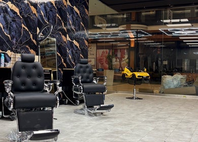 Elegant barber chairs at Bedford (Sunnyside Mall) salon in Bedford, Nova Scotia, CA with sophisticated decor.