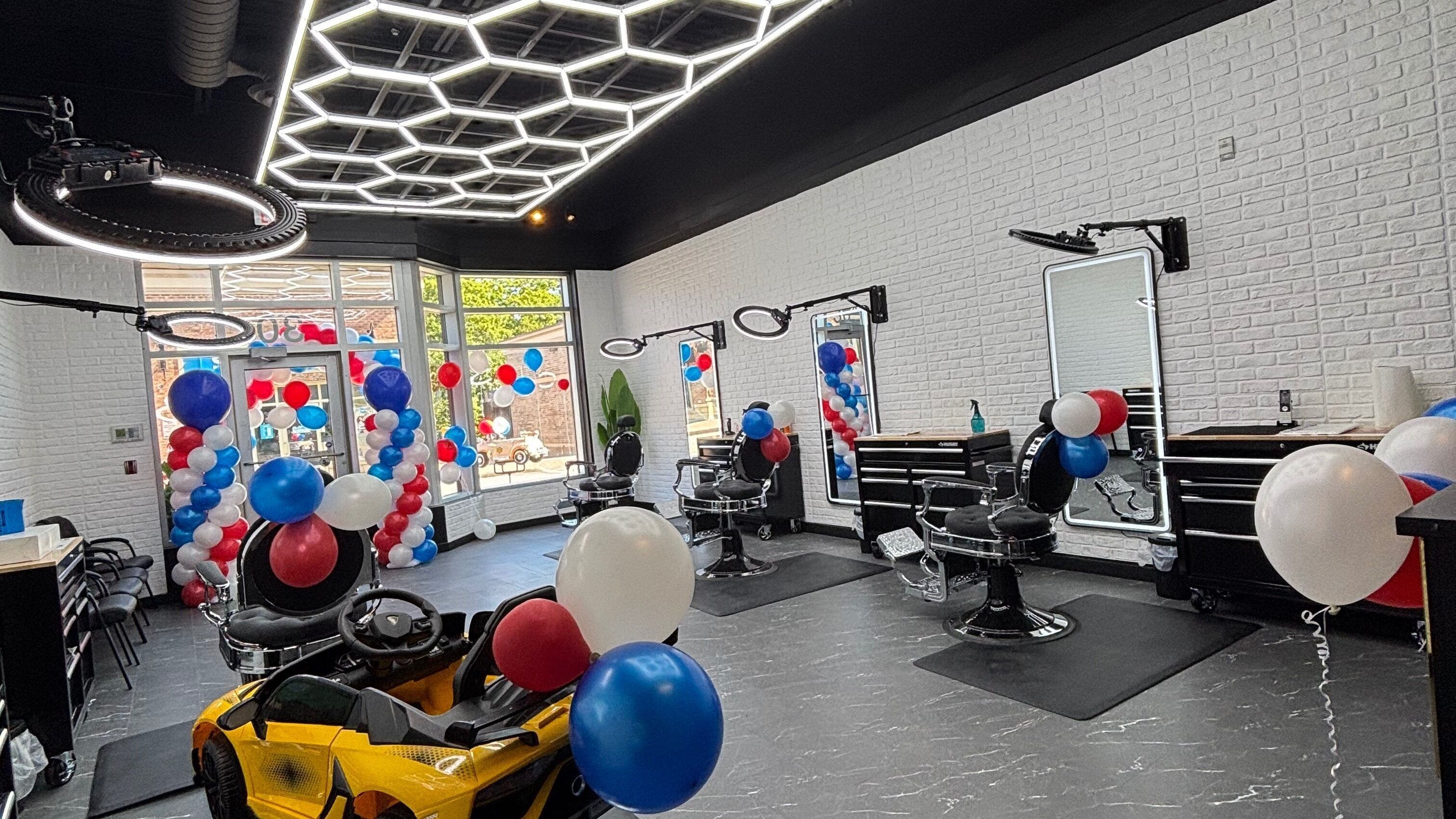 Modern barbershop interior at Dartmouth Crossing in Dartmouth, Nova Scotia, CA decorated with colorful balloons.