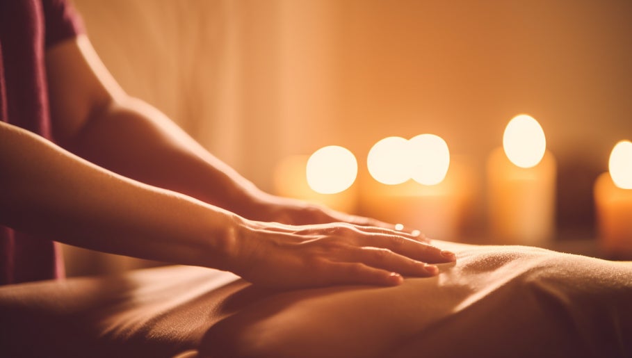 Relaxing massage session at Sari Kayangan Spa & Wellness in Sepang, Selangor, MY with soothing candles.
