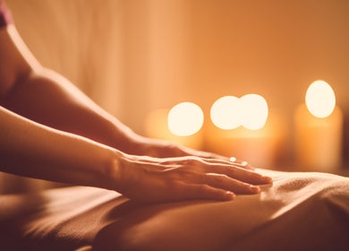 Relaxing massage session at Sari Kayangan Spa & Wellness in Sepang, Selangor, MY with soothing candles.