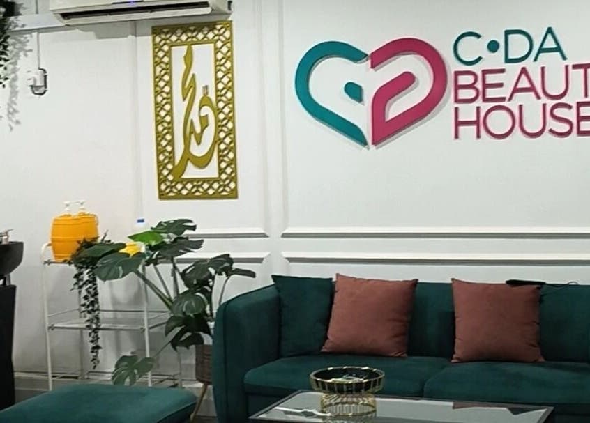 Spacious and welcoming lounge at Cda Beauty House, Klang, Selangor, MY with deep green sofa and decor.