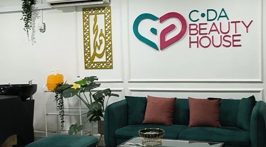 Spacious and welcoming lounge at Cda Beauty House, Klang, Selangor, MY with deep green sofa and decor.