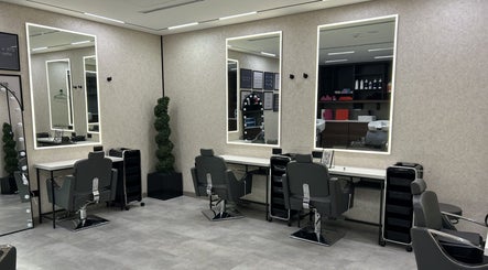 Elegant salon interior at Villa 8 Ladies Salon and Spa, Dubai, Dubai, AE, featuring stylish chairs and mirrors.