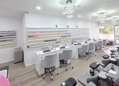 Elegant nail salon at Unique Beauty & Nails, Melbourne, Victoria, AU with modern decor and comfortable seating.