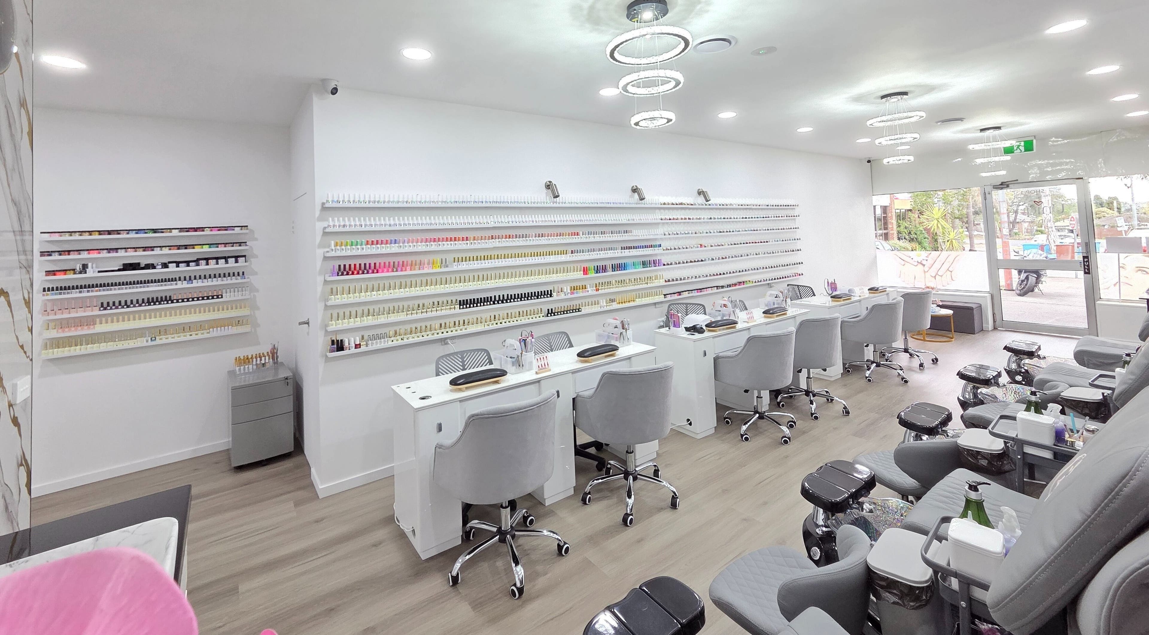 Elegant nail salon at Unique Beauty & Nails, Melbourne, Victoria, AU with modern decor and comfortable seating.