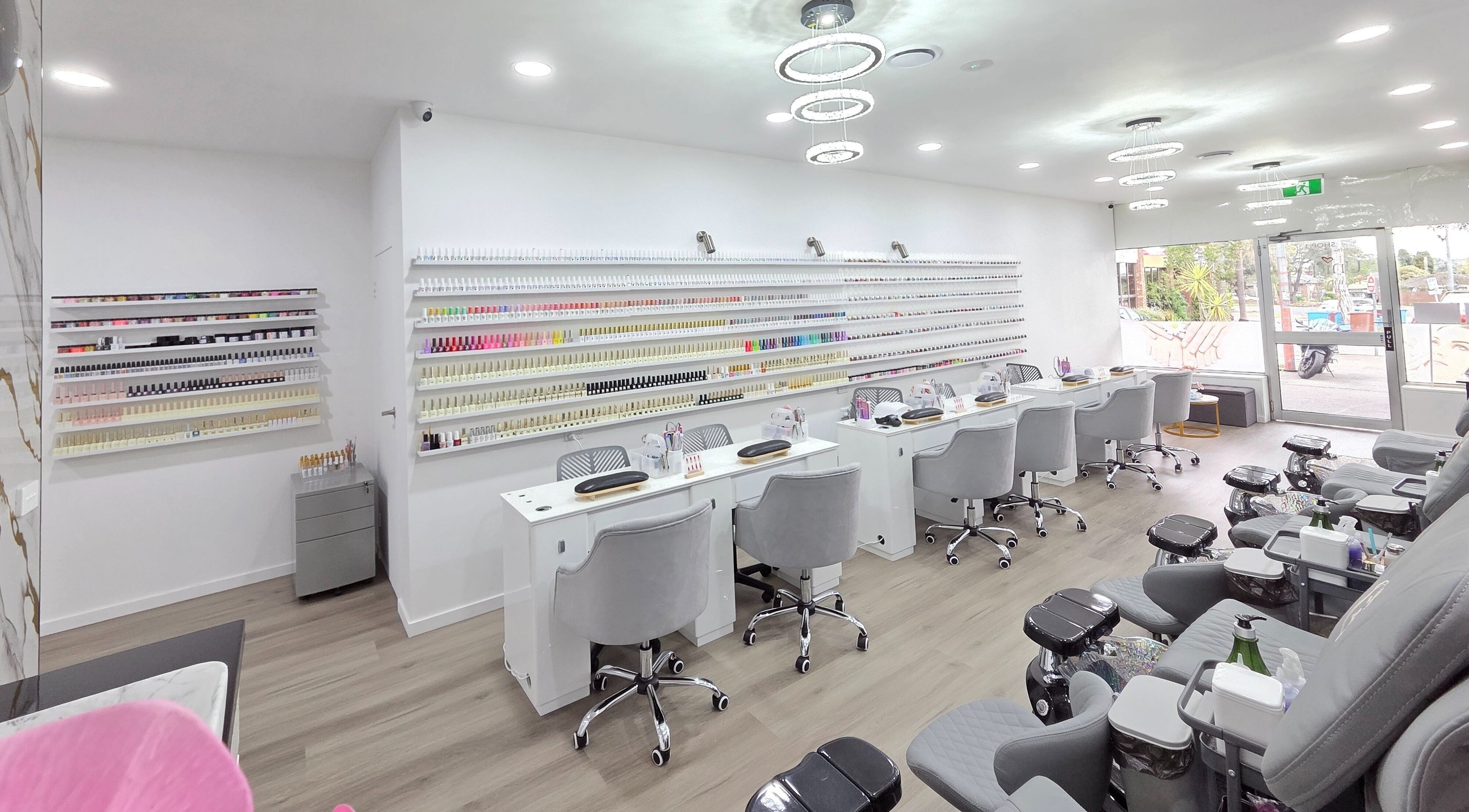 Elegant nail salon at Unique Beauty & Nails, Melbourne, Victoria, AU with modern decor and comfortable seating.
