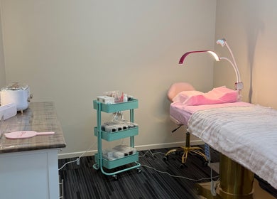 Cozy treatment room at Fancy Lashes TSV, Aitkenvale, Queensland, AU with a cushioned bed and serene lighting.