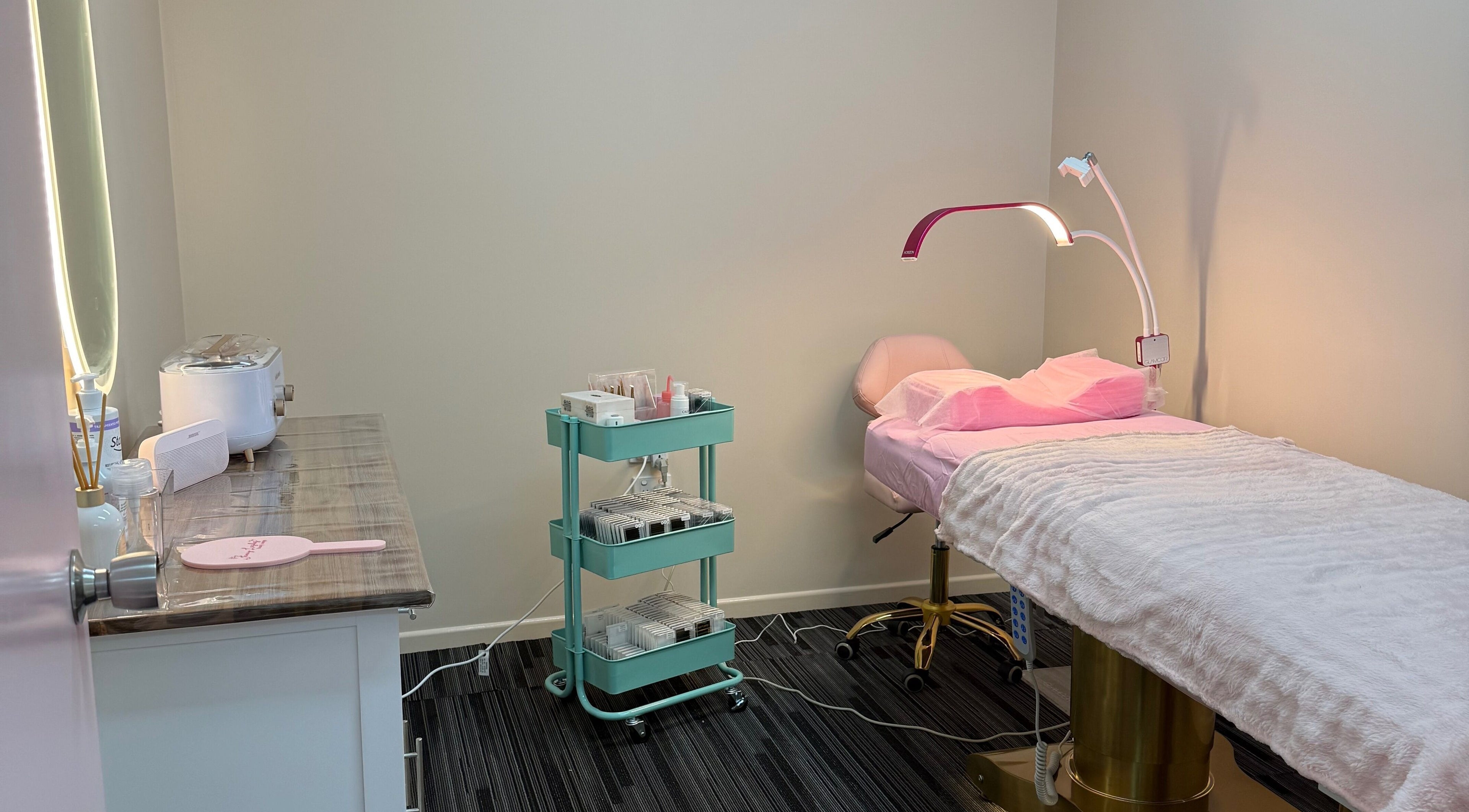 Cozy treatment room at Fancy Lashes TSV, Aitkenvale, Queensland, AU with a cushioned bed and serene lighting.