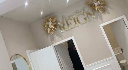Elegant wall decor with 'Reign' sign at The Tan Tent, Glasgow, Scotland, GB.