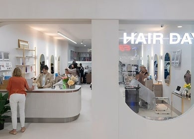 Inside view of Hair Day salon at Victoria Park, Western Australia, AU showcasing reception and styling stations.